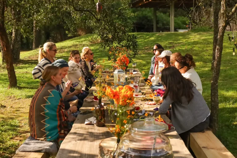 group eating outdoor table