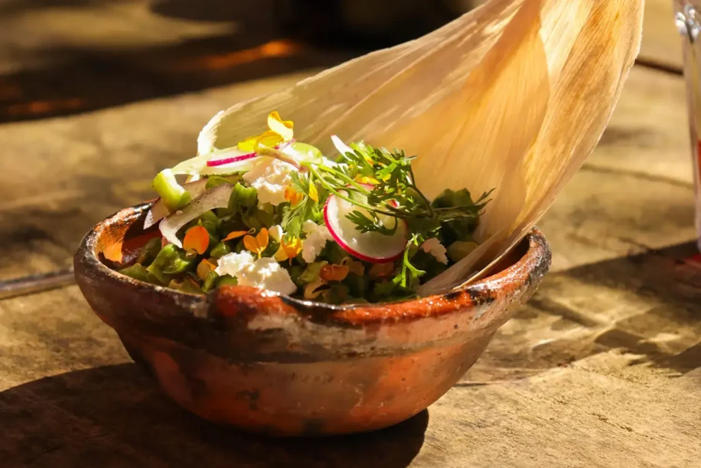 organic salad in a clay bowl