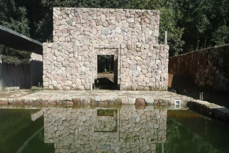 stone room pool reflection